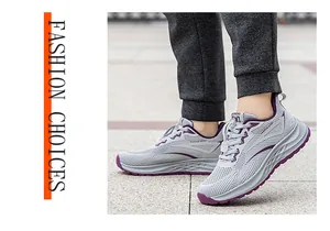 Breathable grey mesh athletic shoes for walking and running shown in an outdoor setting