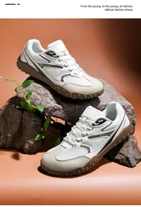Vista detallada profesional de las zapatillas de entrenamiento de malla en rocas