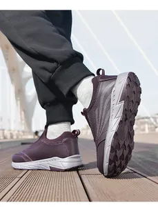 Side view of comfortable slip-on walking shoes for elderly with durable leather surface
