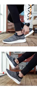 Detail of breathable grey flyknit sock sneakers with comfortable slip-on design