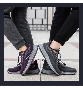 Close-up of breathable fly-knit running shoes in purple and grey colors