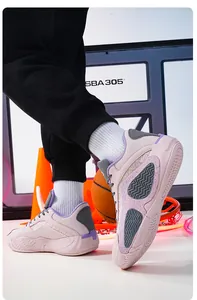 Close-up detail of breathable pink low-top basketball shoes with non-slip mesh upper design