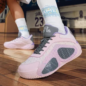 Pink low-top basketball shoes for men and women featuring breathable mesh for training