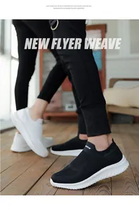 Detailed lifestyle shot of breathable black and white flyknit slip-on sneakers