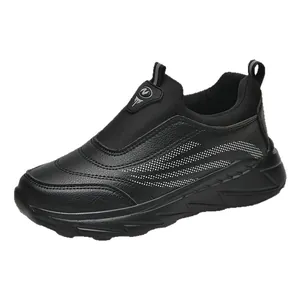 All-black slip-on walking shoes for elderly with durable leather upper and textured sole