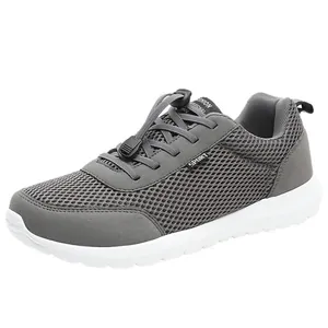 Men's gray breathable mesh walking shoe with lightweight cushioned white sole