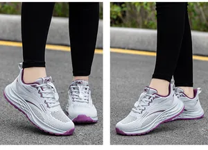Grey breathable fly-knit mesh sneakers with purple accents and quick lace system