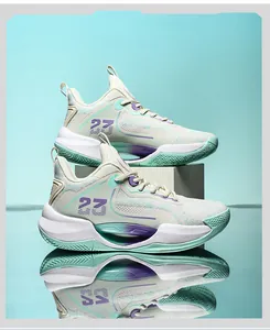 Close-up detail of breathable low-top basketball shoes in a stylish turquoise and white color scheme.