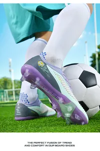 Close-up of children's soccer cleats with long studs for grass training