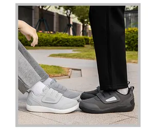Lightweight breathable mesh walking shoes with velcro straps shown in an outdoor park