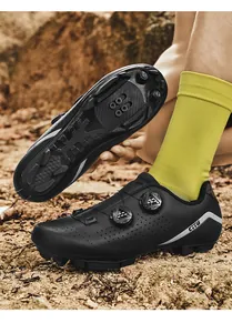 Close-up of black MTB cycling shoe sole and side profile with dual rotary dial lace system
