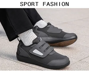 Detailed view of grey mesh walking shoes with adjustable velcro straps for seniors