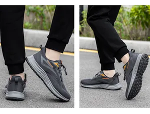 Detailed view of lightweight grey mesh sports sneakers worn during an outdoor walk.
