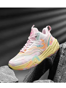 Close-up detail of colorful mesh basketball shoes with '23' side print on stone background