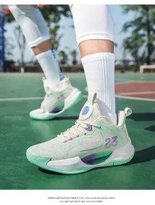 Breathable low-top mesh basketball shoes with vibrant mint green and purple accents.