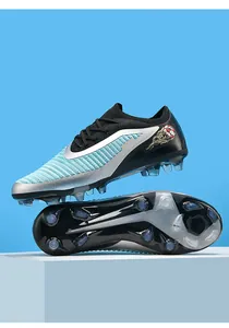 High-performance flyknit soccer cleats with FG studs for firm ground competition