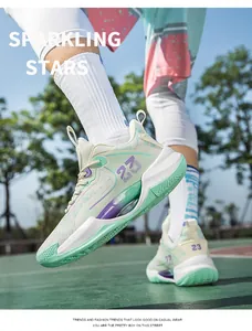 Action shot of breathable mint green low-top basketball shoes on an outdoor court