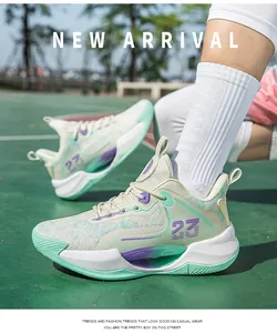 Action shot of breathable low-top basketball shoes in mint green on an outdoor court
