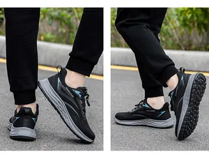 Detail view of lightweight breathable black mesh running shoes for men and women