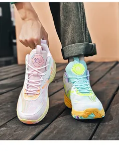 Close-up detail of asymmetrical colorway basketball shoes with breathable mesh upper