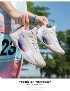 Detail showing breathable mesh upper and MD sole of stylish pink basketball shoes