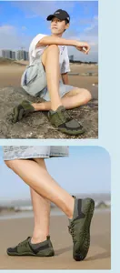 Breathable green flying-woven five-finger water shoes for beach sports and swimming.