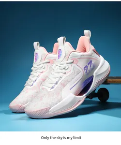 Side view of pink and white breathable low-top basketball shoes with mesh upper.