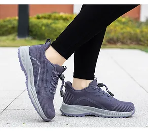 Outdoor detail view of purple mesh walking sneakers for men and women with speed laces