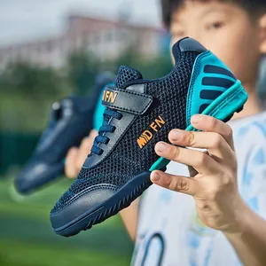 Chaussures de football respirantes pour garçons avec tige en mesh et semelle TF bleu