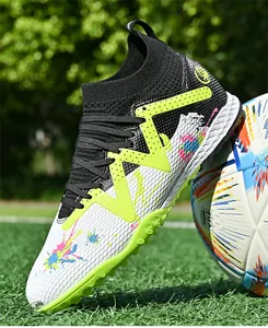 High-top soccer shoes with colorful splash patterns and turf studs for men training
