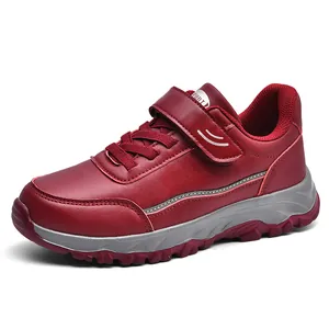 Comfortable burgundy leather walking shoes for seniors with hook-and-loop strap closure