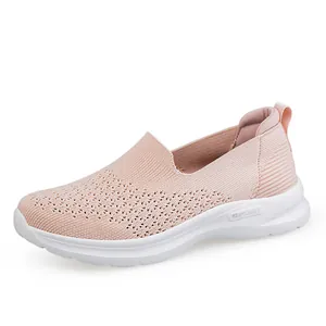 Ademende roze fly-knit mesh slip-on wandelsneakers voor dames met witte zool