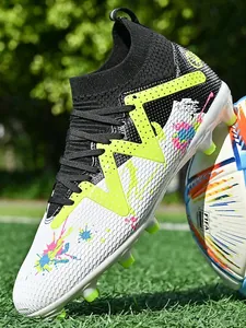 Professional high-top soccer cleats with colorful paint splash pattern and AG/FG studs