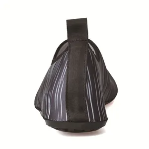 Detailed back view of quick-dry water shoes featuring a black pull tab and striped fabric.