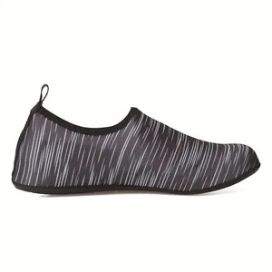 Side view of quick-dry swimming water shoes featuring a black and white striped mesh design