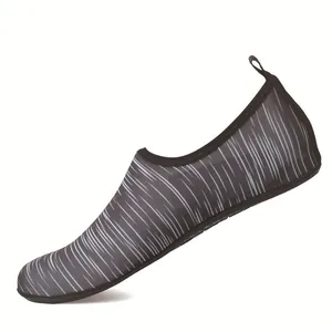 Side profile view of a gray striped quick-dry water shoe for swimming and yoga activities.