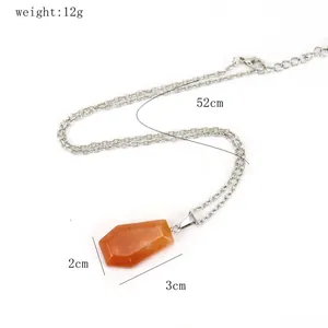 Detail view of orange crystal coffin necklace with length and weight measurements