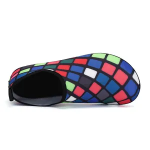 Close-up detail of colorful mosaic pattern elastic mesh water shoes for swimming and yoga
