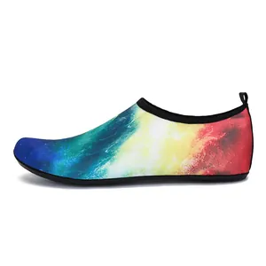 Detailed side view of a colorful galaxy print aqua shoe featuring a breathable mesh upper