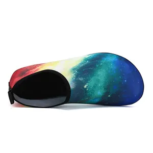 Detail view of elastic mesh aqua shoes with vibrant galaxy nebula print