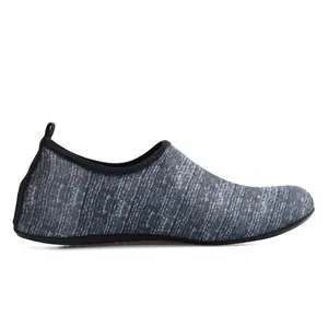 Detailed side view of grey melange elastic mesh aqua shoes for swimming and yoga