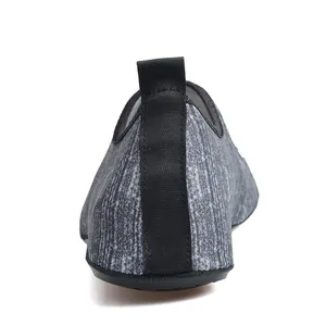 Detailed rear view of gray stretch mesh water shoe showing functional black heel pull tab.