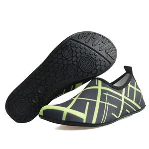 Close-up of lightweight quick-dry swim shoes featuring a durable non-slip rubber sole