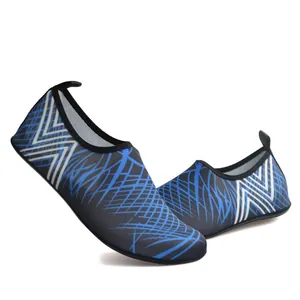 Detailed view of blue patterned quick-dry water shoes with white zig-zag stripes.