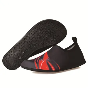 Anti-slip rubber sole and elastic upper detail of these black and red swim shoes