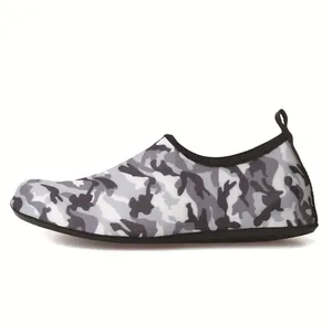 Detailed side profile view of grey camouflage slip-on water shoes with elastic mesh fabric
