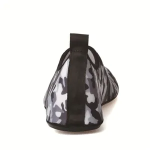 Close-up back view of camouflage print aqua shoes with functional black heel pull tab