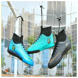 Detail view of high-top soccer training shoes with textured synthetic leather upper
