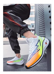 Detailed view of white lightweight mesh running shoes featuring a blue lightning bolt design