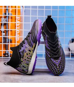 Detail view of high-top football boots with purple flyknit mesh and 'CONTROL' text